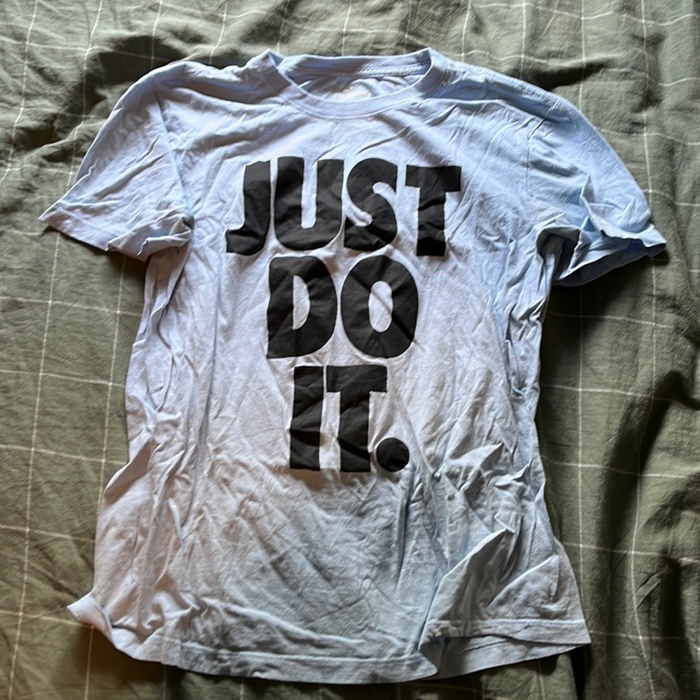 The Nike Tee shirt, size medium